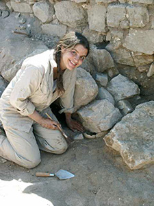 Janelle Worthington with Late Bronze Lamp beneath Stone