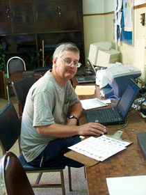 Larry Murrin entering photos and creating programs for handling our archaeological data