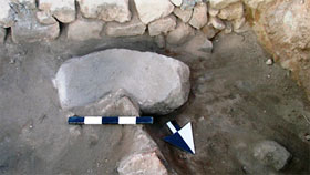 Large lower grinding stone in late 13th-century house in Field A