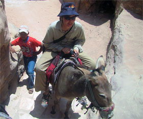 Petra - Aran McDowell on donkey for trip to The Monastery
