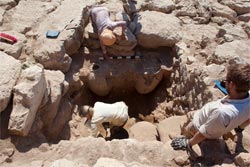 Two pithoi under excavation