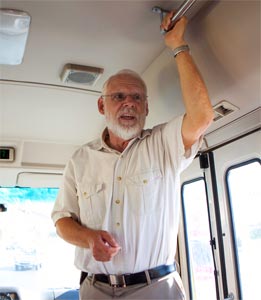 Doug Clark holding forth on the bus