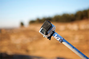 4K GoPro camera on the end of a GPS rod for photogrammetry in deep places
